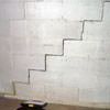 A diagonal stair step crack along the foundation wall of a Glennallen home