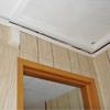 The ceiling and wall separating as the wall sinks with the slab floor in a Glennallen home