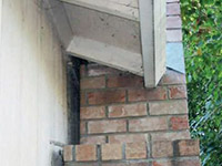 A chimney leaning away from the home on a Yakutat foundation