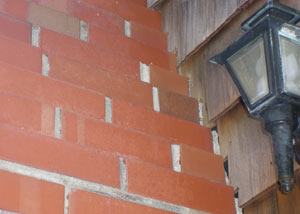 a repaired chimney in Copper Center that had shown serious foundation damage and was repaired with a helical pier system.