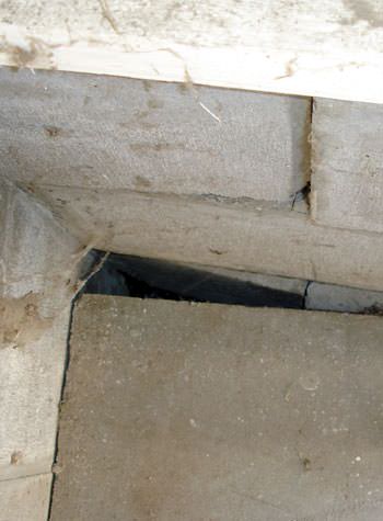 inward rotation of a foundation wall damaged by street creep in a garage in Angoon