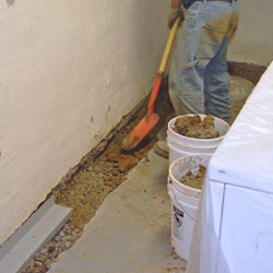 Digging a trench for a French Drain system in Anchorage