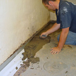 Testing a French drain system in a Haines home.