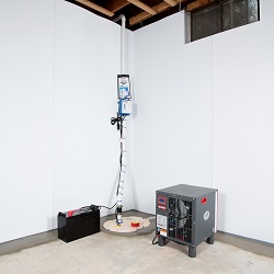 Sump pump system, dehumidifier, and basement wall panels installed during a sump pump installation in Girdwood